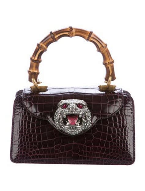 Thiara crocodile handbag Gucci Purple in Crocodile 